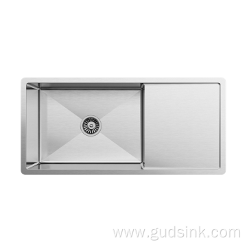 Stainless steel kitchen sink with drainboard